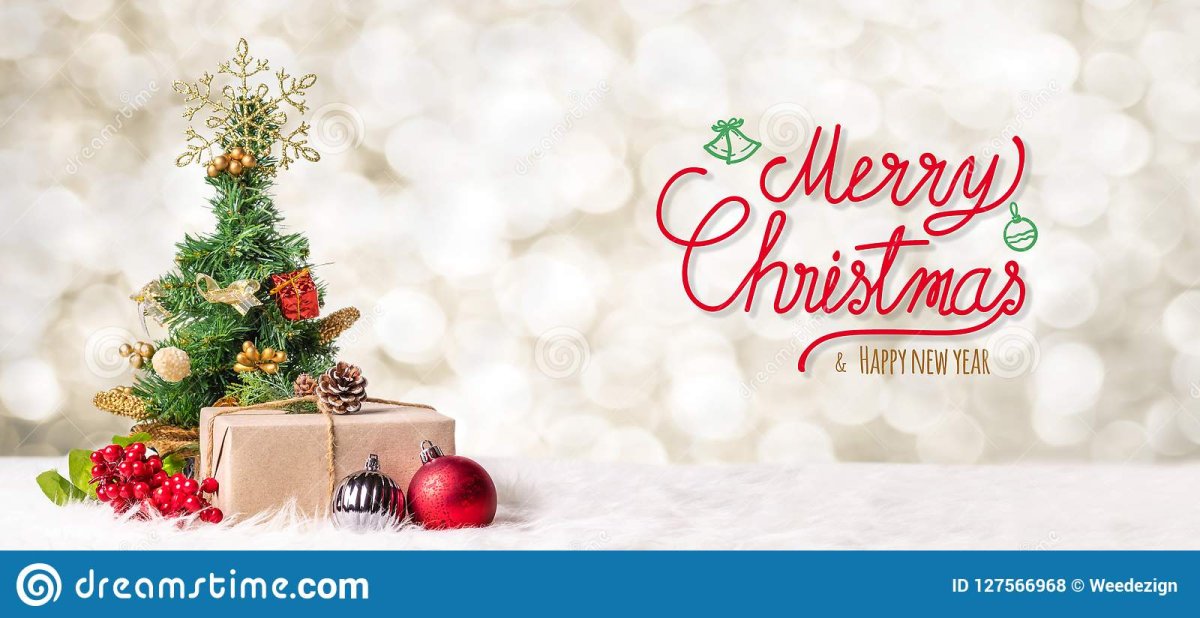 red-merry-christmas-happy-new-year-handwriting-xmas-tre-tree-gift-box-blur-bokeh-light-backgro...jpg