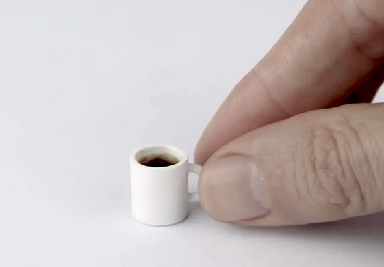 Screenshot 2023-04-27 at 22-01-32 holdingtiny coffee cup - Google Search.png