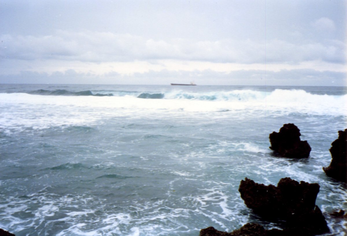 Stormy seas with ship in the background.jpg