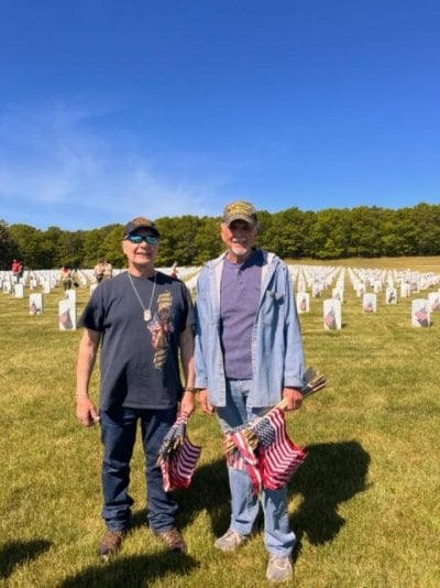 Tom and me placing flags.jpeg