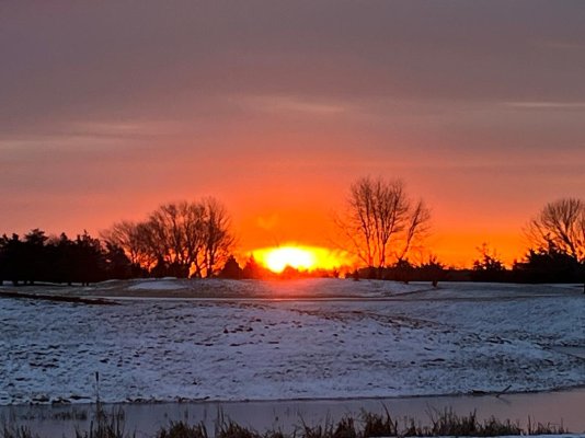 Sun over golf course.jpeg